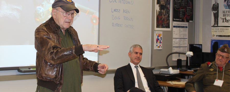 Veterans Bob Satter, Doug Brown and Larry Aasen talk to BMS 8th graders about what it was like to serve in the military.  Satter is recounting his 32 missions over enemy territory in WWII. 