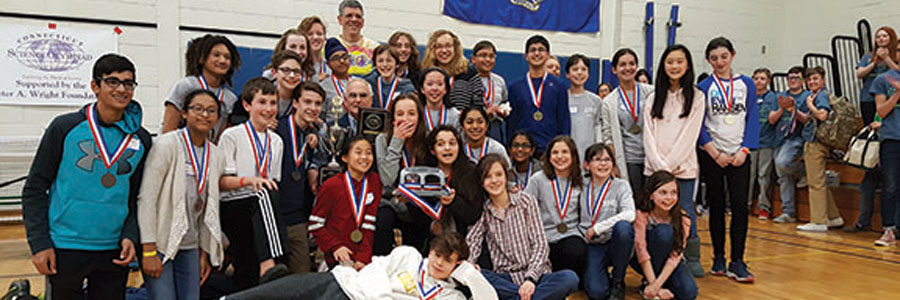 Bedford’s Science Olympiad team celebrates a win after many hours of hard work since the school year began.