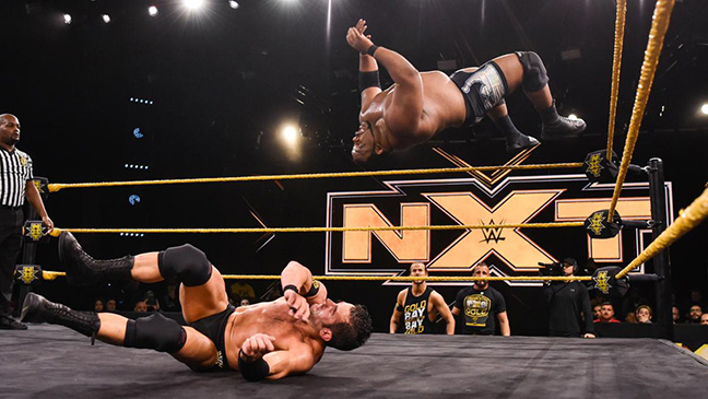 Roderick+Strong+trying+to+avoid+a+moonsault+by+%E2%80%9Climitless%E2%80%9D+Keith+Lee+during+WWE%E2%80%99s+NXT.