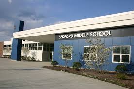 A photo of the front of Bedford MIddle School.