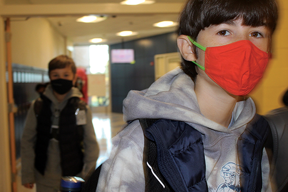 Students must still wear masks and socially distance as experts determine if and students under 12 can get vaccinated.