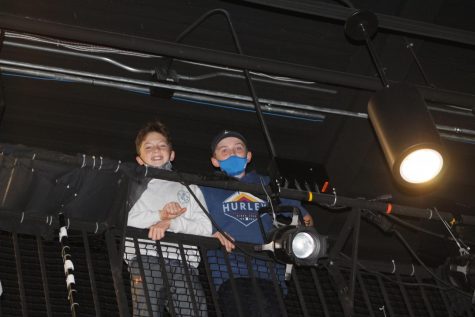Tyler Little and Nate Hammond working the lights on the catwalk for “Annie”