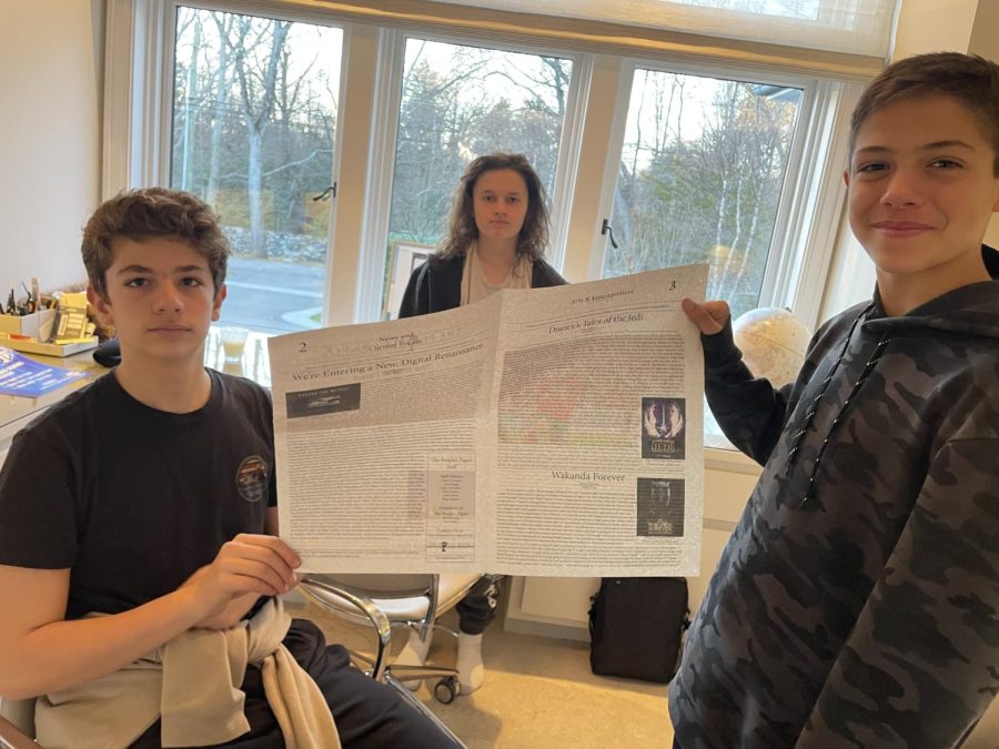 Ryan Shapiro, Maceo Cipriano, and Nick Matra with the first issue of a newspaper produced entitely on their own.